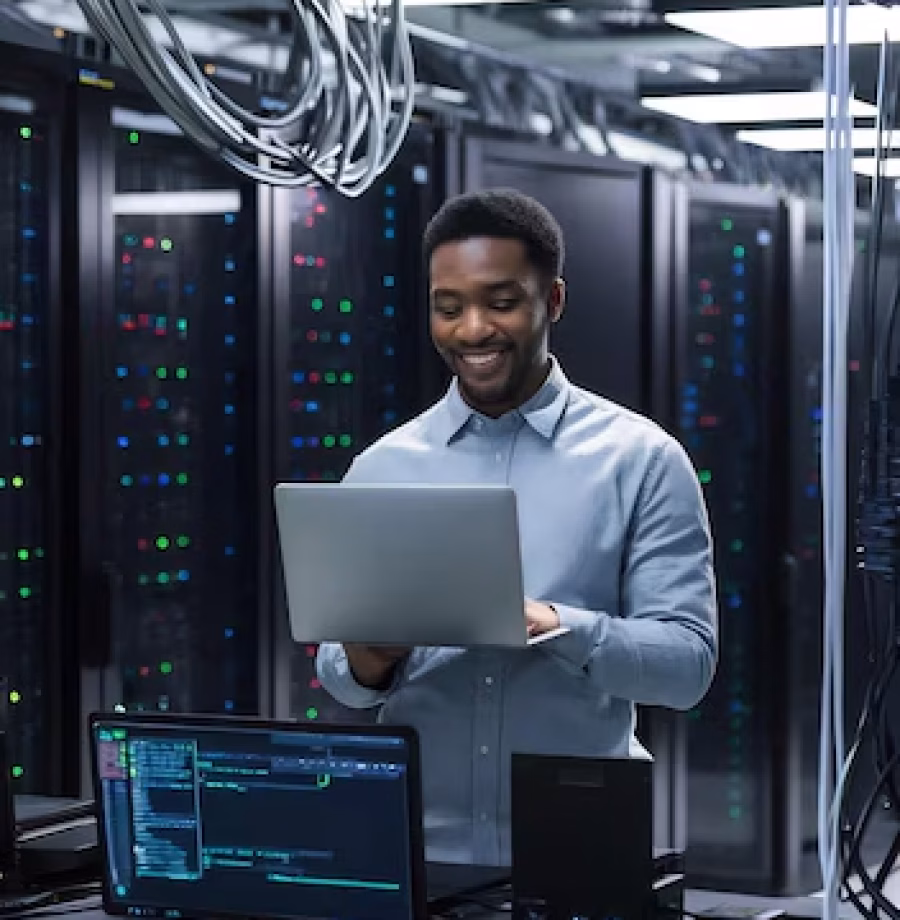 laptop-server-room-black-man-network-maintenance-programming-software-typing_1313853-19522